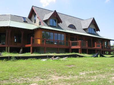 The railing along the back deck can be seen in this and the photo before