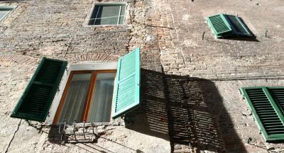 Shadows in a side street, Siena