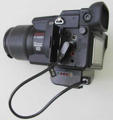 This show the DPS9000 attached to the Olympus E-100RS

By   Canadian Club
