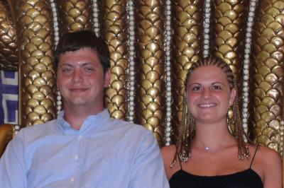 Josh and Elizabeth on the fancy throne just outside the doorway into the Atlantis Casino