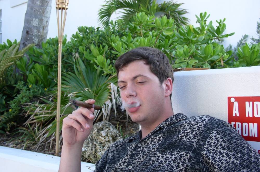 Josh enjoying a $25 Monte Christo cigar straight from Havana