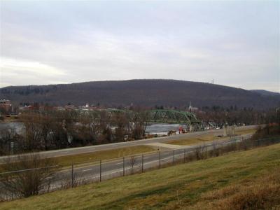 Bridge with section over highway gone.