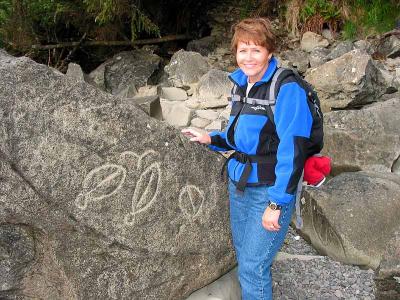 Carol by the petroglyphs at Wedding Rocks