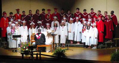 Mallory singing in the choir during graduation
