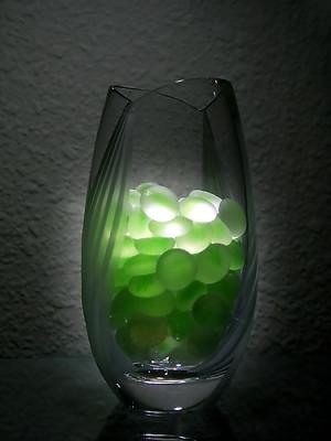 10th (tie) Light on marble pebbles in a vase>by Kuntal Daftary