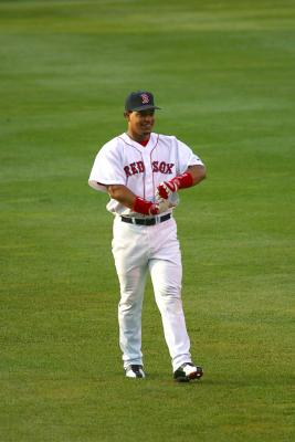 Manny Ramirez warming up in the outfield prior to the game.