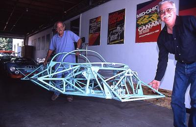 Carry the chassis into the shop,My freind Mike helping. Total weight for the chassis 109 lbs.