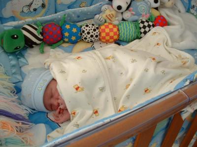 full max asleep in the crib.jpg
