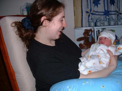 u32/bigpaulo/medium/21220949.mommyandmaxinrockingchair.jpg