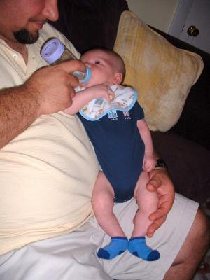 daddy feeding Max June 11th.jpg
