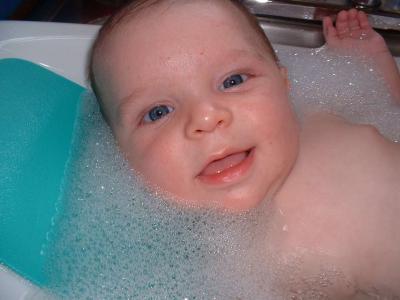 Aug8_max_loving_his_bath.jpg