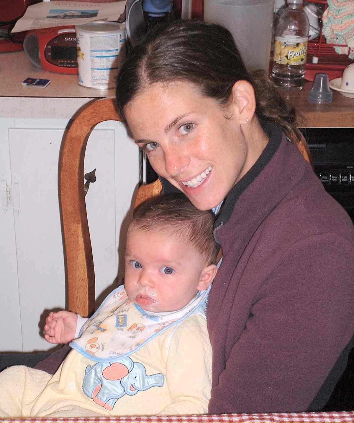 Auntie feeds Max his first cereal