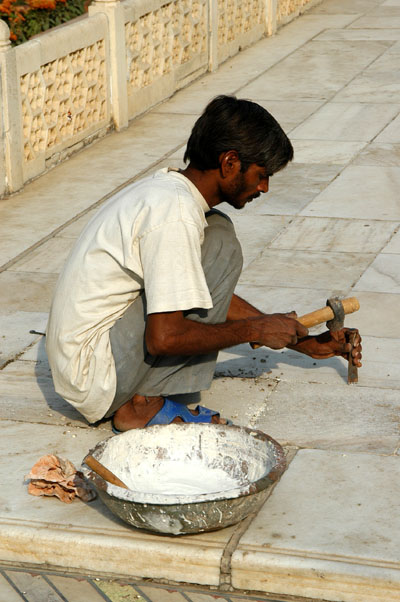 Making repairs, Agra Fort