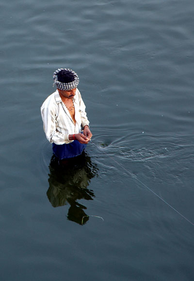 Man fishing in the Yamuna River, Agra