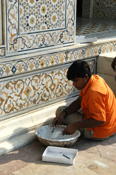 Making repairs to the inlaid stone work