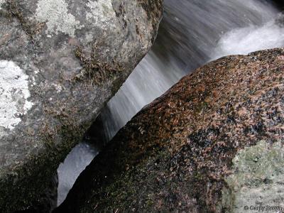 Clear Creek visible in gap between rocks