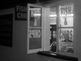 <b>window</b> of a shop selling chips and <b>fish </b>