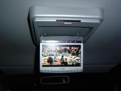 Robbie Williams on the screen in the Limo to Noordwijk