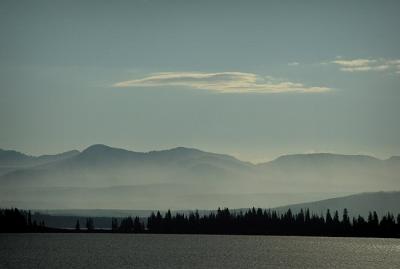 misty mountain across yellowstone lake