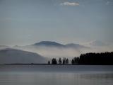 misty mountain morning across yellowstone lake