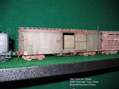 Incredible weathering on On3 box car from San Juan Car Shops