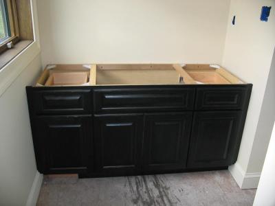 the loft bathroom cabinets are in,