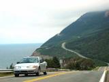 The Cabot Trail hugs the mountain side and winds its way around coastal views