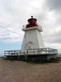 The lighthouse at Neils Harbour was established in 1899 and is now managed by the Canadian Coast Guard