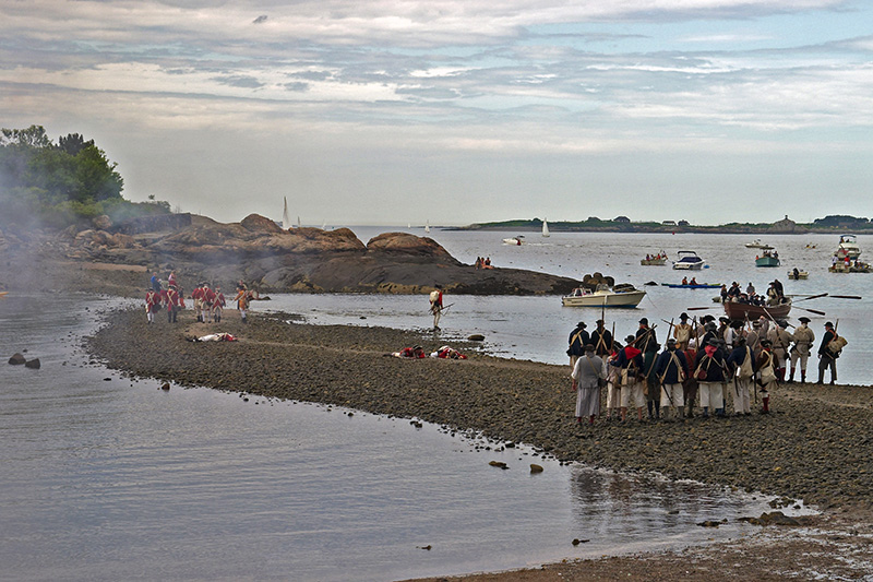 Victory is assured as Red Coat casualties litter the beach.