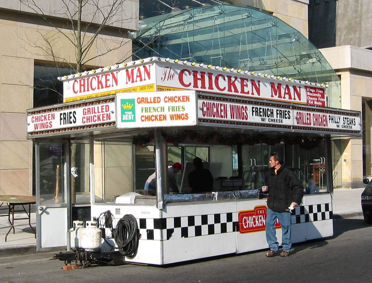 Setting Up the Spring 2003 Fair - Chicken Man at LaGuardia Place