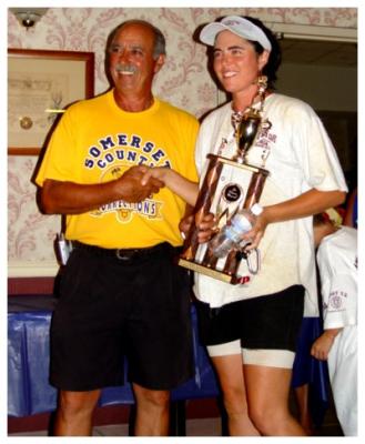 Sheriff Provenzono presenting trophy to Becky