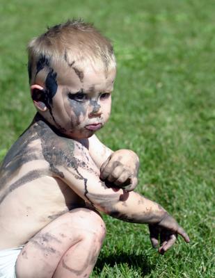 Drive by Painting
Josh and Jonah painted Ethan today.  He didn't seem to mind very much!  They played in the sprinkler to get cleaned up when they were finished.