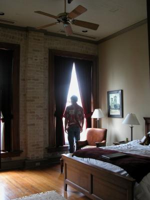 Mark looking out the window of our room