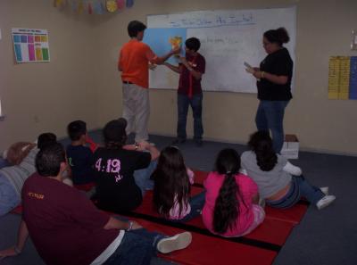 Story time using a felt board.