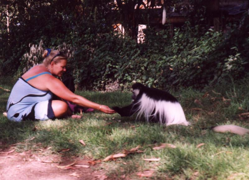 Sally feeding monkey
