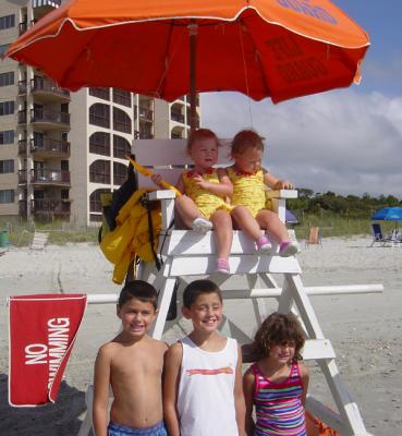 5 little life guards Rory on the left in the chair and Scott, Andrew and Jennifer in front
