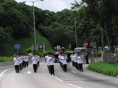 Police Band led the funereal parade to march.