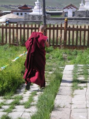 Monk on his mobile phone