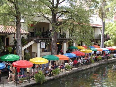 Casa Rio, the first restaurant on the Riverwalk. Our table was the first yellow umbrella from the left.