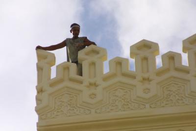 man standing on a mosq