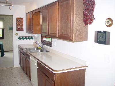 NEW KITCHEN CABINETS, COUNTERTOPS AND FLOOR