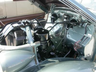 Engine compartment after.  Hood springs are cad (zinc plated)