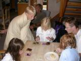 At the Aviemore time-share, Julie does card tricks, while Jake freezes