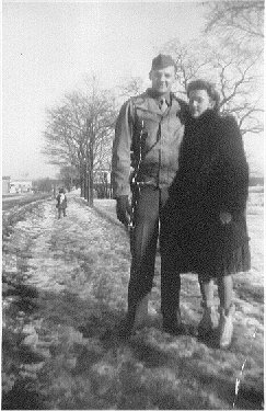 Dad and Ma 1945  Sue in background