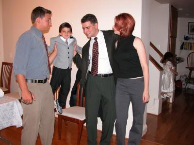 u32/richk/medium/21158856.DSCN0768danieljessehelpingadamupandalaina.jpg