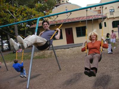 happy rich and galina on swings at glen echo