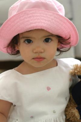 Girl in pink hat