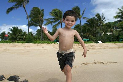 u32/rn65/medium/31611724.RunningtowardtheoceanPoipubeachHawaii.jpg