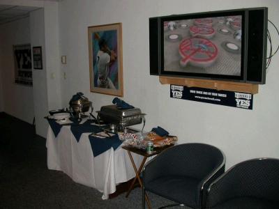 Food trays, flat plasma display to watch game