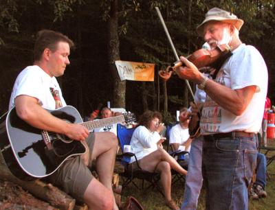 The campfire musicians start jamming after Saturday dinner